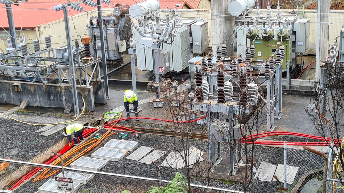 Prowire electricians installing HV cable in a substation
